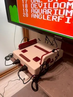 a nintendo wii game console sitting under a tv at MSTAY\u6771\u6c60\u888bone in Tokyo