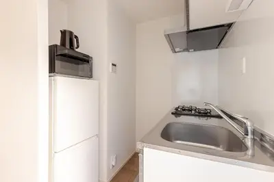 a kitchen with a sink and a refrigerator at ksf\u4e0a\u6c60\u888b3\u4e01\u76ee302 in Tokyo