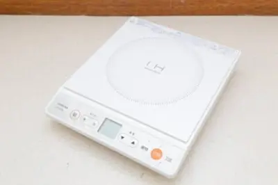 a nintendo wii game system sitting on a table at Keiko House in Tokyo