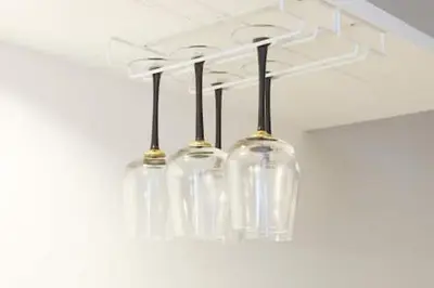 a group of glass lights hanging from a ceiling at Keiko House in Tokyo