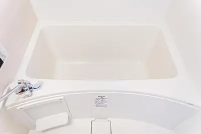 a bathroom with a white toilet and a sink at Industrial room in Tokyo