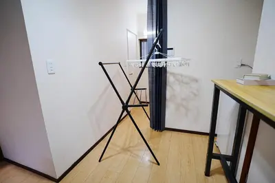 a glass table on a tripod in a room at Industrial room in Tokyo