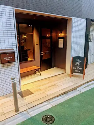 an open door of a building with a bench in it at Ciel de Kagurazaka Familial iidabashi \u65b0\u5bbf\u795e\u697d\u5742\u98ef\u7530\u6a4b ## Shuttle, Ticket, Restaurant reservation service ## in Tokyo