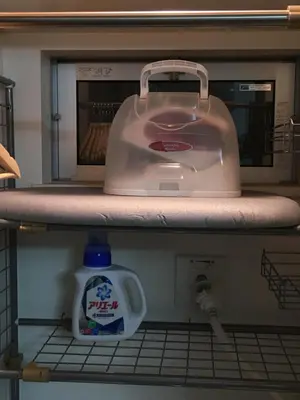 a toaster sitting on a shelf with a jug of milk at \u65b0\u5bbf\u99c5\u307e\u30672\u5206\u65b0\u5927\u4e45\u4fdd\u6238\u5efa\u30663br in Tokyo