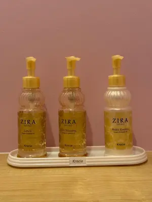 three bottles of alcohol on a tray on a table at Luce Stay&Resort Evoluto101 in Urayasu