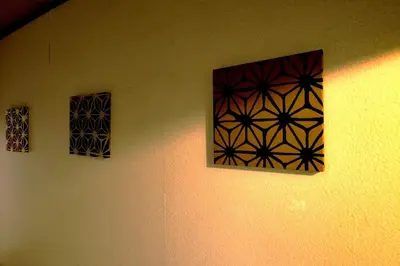 three windows on a wall in a room at Joyfull House in Tokyo