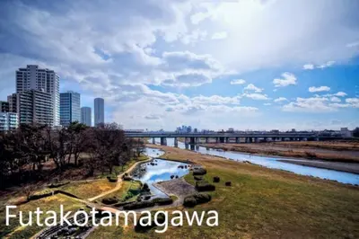 a view of a river with a bridge in the background at \u30dc\u30f3\u30a2\u30fc\u30c8\u702c\u7530 in Tokyo
