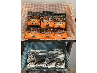 a display of spicy sticks on a shelf at eeGee STAY Kamata