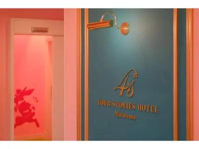 a room with a door with a sign on the wall at FourStoriesHotelMaihama Tokyo Bay - Vacation STAY 73101v in Tokyo