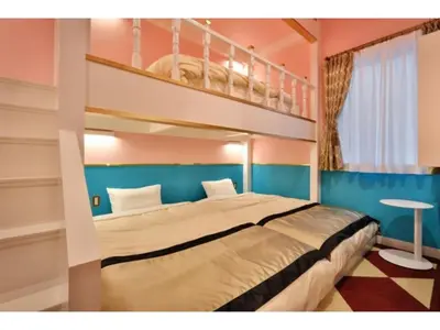a bedroom with a bunk bed and a staircase at FourStoriesHotelMaihama Tokyo Bay - Vacation STAY 73118v in Tokyo