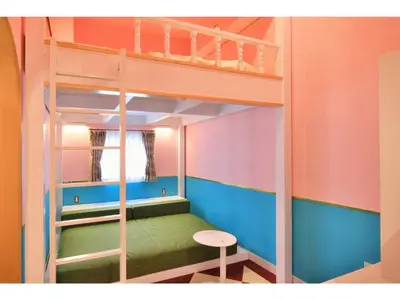 a room with a bunk bed and a stool at FourStoriesHotelMaihama Tokyo Bay - Vacation STAY 73130v in Tokyo