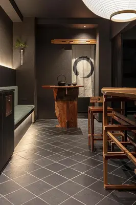 a room with a table and some chairs and a table at ENSO TOKYO Akasaka in Tokyo