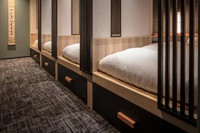 a room with two bunk beds in a room at ENSO TOKYO Akasaka in Tokyo