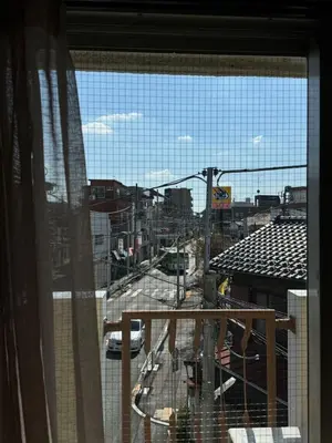 a view of a city from a window at TD Link Ooyama Cozy Escape Sleeps 8 Direct to Ikebukuro in Tokyo