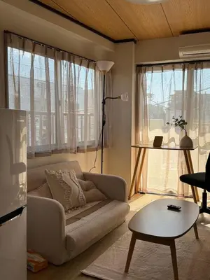 a living room with a couch and a table at TD Link Ooyama Cozy Escape Sleeps 8 Direct to Ikebukuro in Tokyo