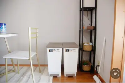 a white refrigerator with a box on top of it at Shibuya-E604 in Tokyo