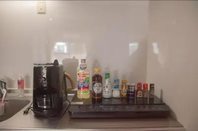 a counter with a coffee maker and a coffeemaker at Shibuya-E604 in Tokyo
