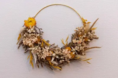 a wreath of dried flowers on a wall at House Hotel Kagurazaka HHK1 in Tokyo