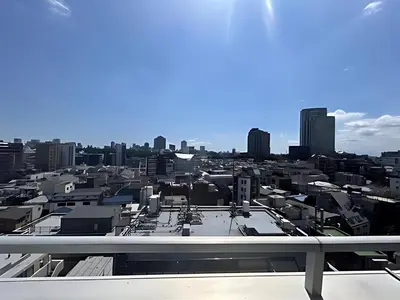 a view of a city from the roof of a building at Ebisu Top floor 1BR Condo with Mount Fuji view in Tokyo
