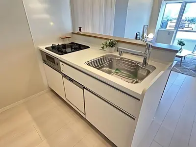 a kitchen with a sink and a stove at Ebisu Top floor 1BR Condo with Mount Fuji view in Tokyo
