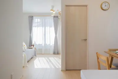 a room with a door leading to a bedroom at Magazine Home Tokyo Spacious 93 3BR Skytree7 minutesAsakusa12 minutes by train in Tokyo