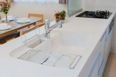 a kitchen counter with a sink and a sink at Magazine Home Tokyo Spacious 93 3BR Skytree7 minutesAsakusa12 minutes by train in Tokyo