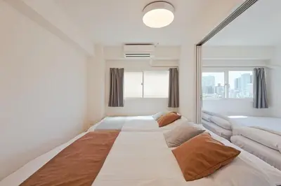 a large bed in a room with a large window at V Close to Shinjuku Kabukicho Korean Town FrWIFI M in Tokyo