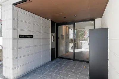 an entrance to a building with a glass door at House hotel EKODA 101 HE11 in Tokyo