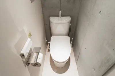 a bathroom with a white toilet in a stall at Tabiya Shinamachi - New built APT at Ikebukuro, Relaxing Stay in Central Tokyo in Tokyo