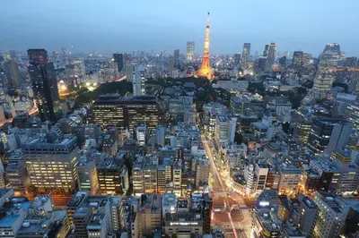 a view of a city at night with the eiffel tower at Tabiya Shinamachi - New built APT at Ikebukuro, Relaxing Stay in Central Tokyo in Tokyo