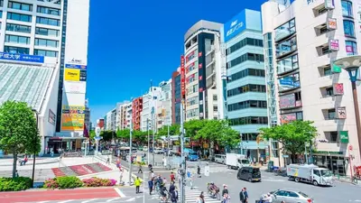a busy street in a city with tall buildings at Near Shinjuku Nakano unit 3 Walking 4 Mins Broadway No2 in Tokyo