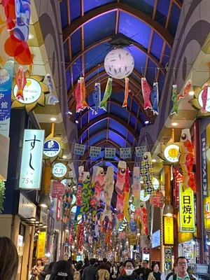 a shopping mall with a clock hanging from the ceiling at Near Shinjuku Nakano unit 3 Walking 4 Mins Broadway No2 in Tokyo