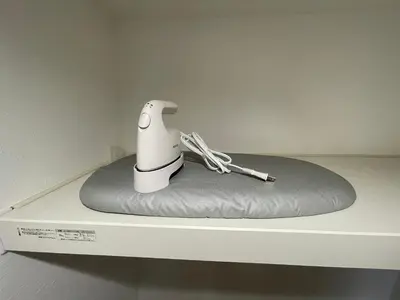 a toy dog is sitting on top of a shelf at MU HOUSE Ikebukuro \u6c60\u888b\u99c5\u8eca1\u5206 in Tokyo