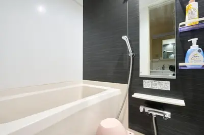 a bathroom with a tub and a toilet and a sink at K1 4min from nearest station 7min to shinjuku area101 in Tokyo