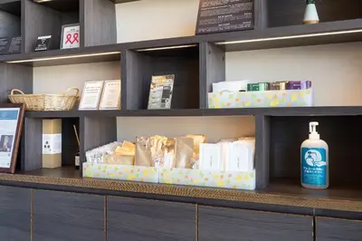 a shelf with boxes of food and a bottle of soap at \u6771\u6025\u30b9\u30c6\u30a4\u9752\u5c71 in Tokyo