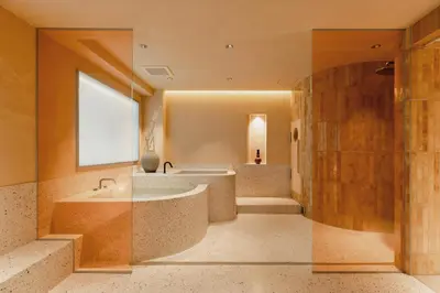 a large bathroom with a tub and a shower at etoe Hotel Shinjuku in Tokyo