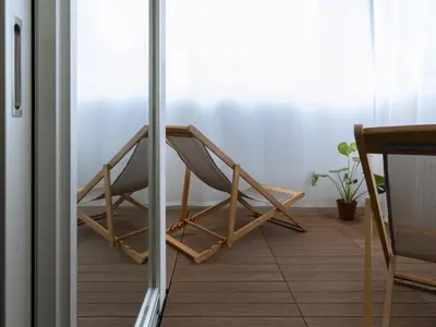a couple of chairs sitting in a room at etoe Hotel Shinjuku in Tokyo