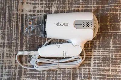 a hair dryer sitting on top of a table at Villa Wisteria Kitazawa -apartment hotel- in Tokyo