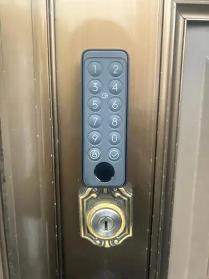 a remote control on the door of a elevator at 西巣鴨 Cozy for 4-12guests 3BR House-3Showers &3Toilets in Tokyo