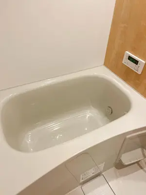 a white bath tub sitting in a bathroom at Stay&resort Luce ルーチェ in Urayasu