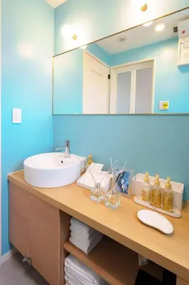 a bathroom with a sink and a mirror at Stay&resort Luce ルーチェ in Urayasu