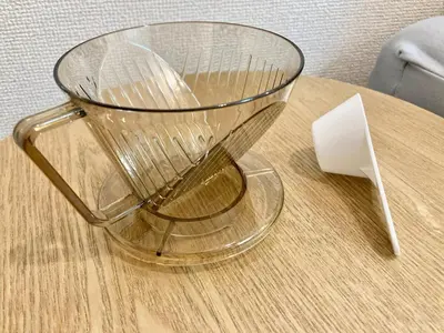 a glass bowl sitting on top of a table at 4min Shinjuku by sub Cozy Mini Room in Tokyo