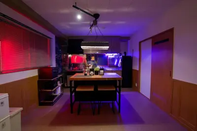 a kitchen with a table with purple lights on it at Palette house Spacious 56 sqm Tokyo Apartment near Station in Tokyo