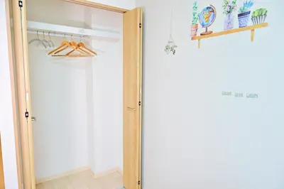 a closet with a wooden door in a room at Subway 2min Skytree#6min Asakusa in Tokyo