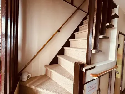 a set of stairs in a house at \u6c60\u888bHouse2F Cozy for 1-3 guests in Tokyo