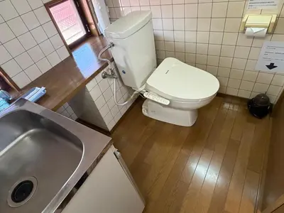 a bathroom with a toilet and a sink at \u6c60\u888bHouse3F Cozy for 1-3 guests in Tokyo