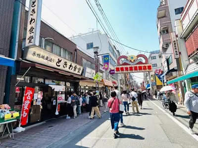 a group of people walking down a busy city street at \u6c60\u888bHouse3F Cozy for 1-3 guests in Tokyo