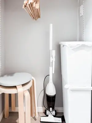 a white room with a table and a white lamp at Triphome Nakano 2025 Bunk bed in Tokyo