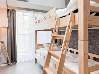 a bunk bed room with two bunk beds at Triphome Nakano 2025 Bunk bed in Tokyo