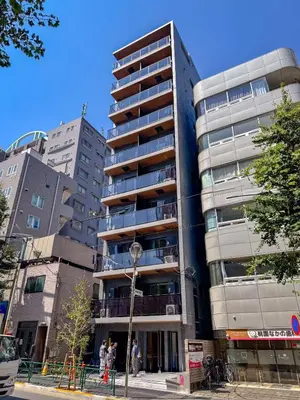 a tall building with people standing in front of it at Triphome Nakano 2025 Green in Tokyo